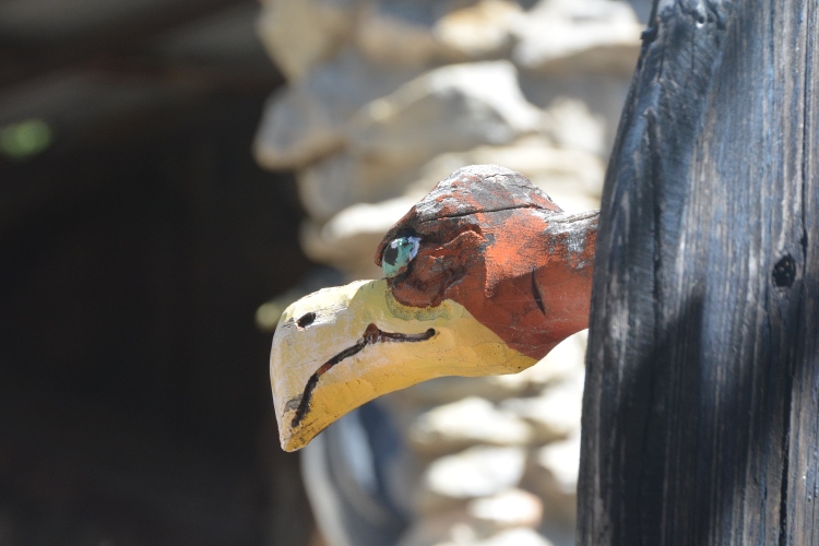 wooden vulture head